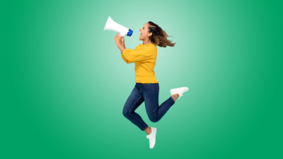 MYC image - Girl jumping and yelling into megaphone