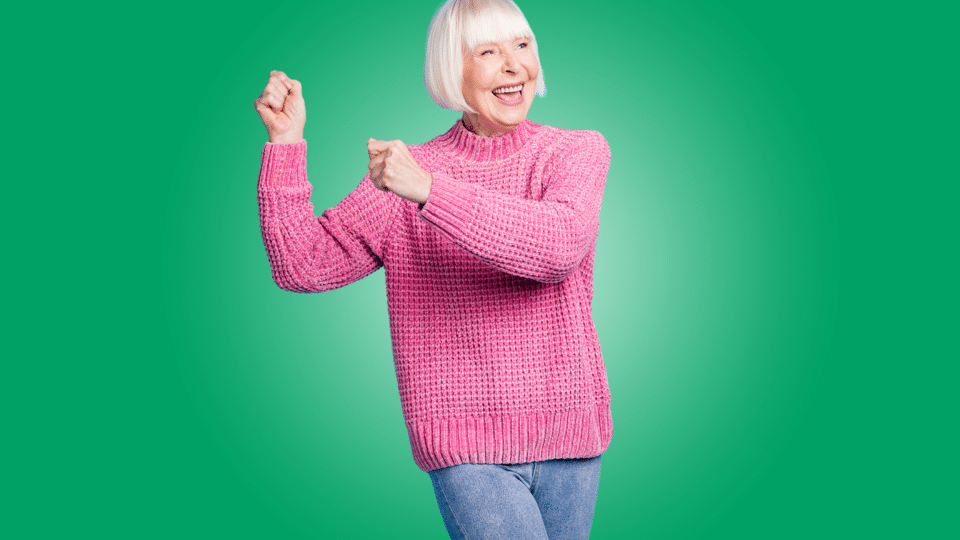 Senior Social Club - an image of an older lady swinging her arms as if she's dancing on a block green background