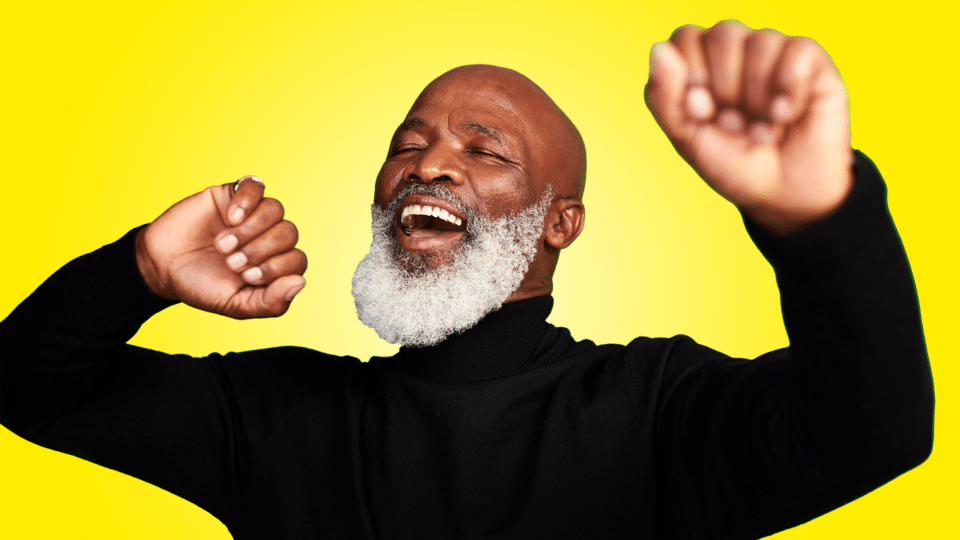 Senior Social Club - an image of an older man dancing on a block yellow background