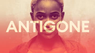 Antigone - Photo of a girl looking directly to camera with the Antigone title text in front