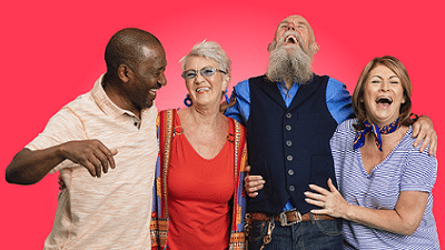 Senior Social Club - photo of four adults with their arms round each other laughing