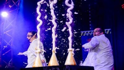 Top Secret - The Magic of Science Two scientists conduct and messy, explosive experiment with beakers on stage
