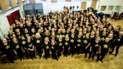 Rock Choir a large group of singers in uniform