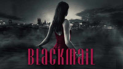 Blackmail - a black and white image of a woman walking through the Thames, in the background is a smoky London skyline, she wears a red dress - the only part of the image that's coloured.