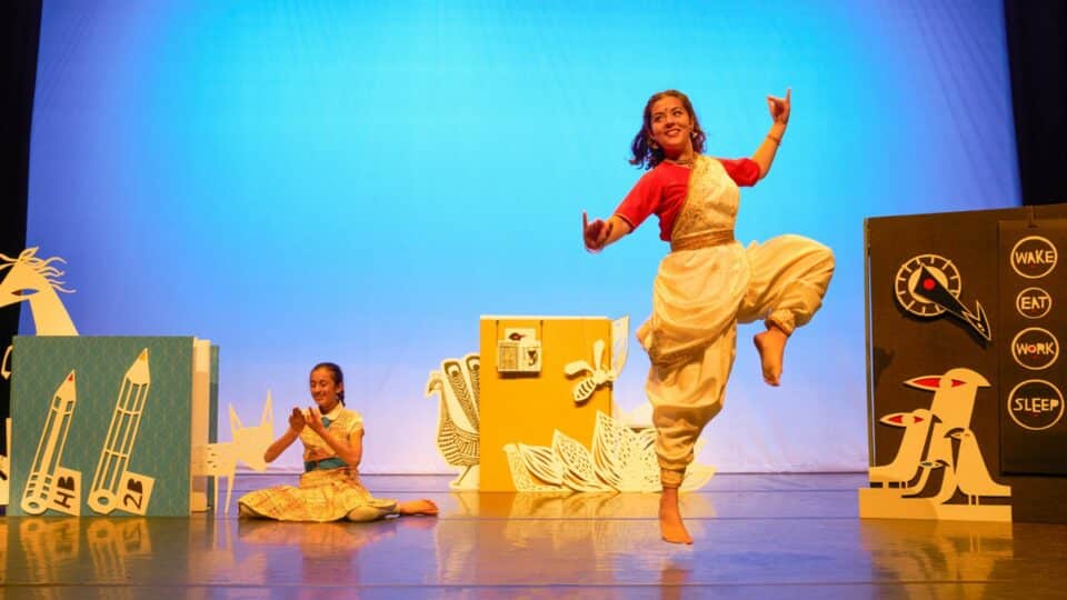 Cast members while performing