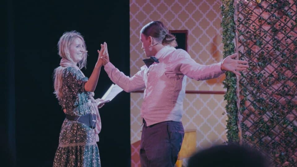 the importance of being... earnest? Two women holding their palms against each other