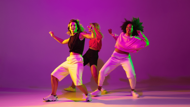 Three girls dancing to Hip Hop